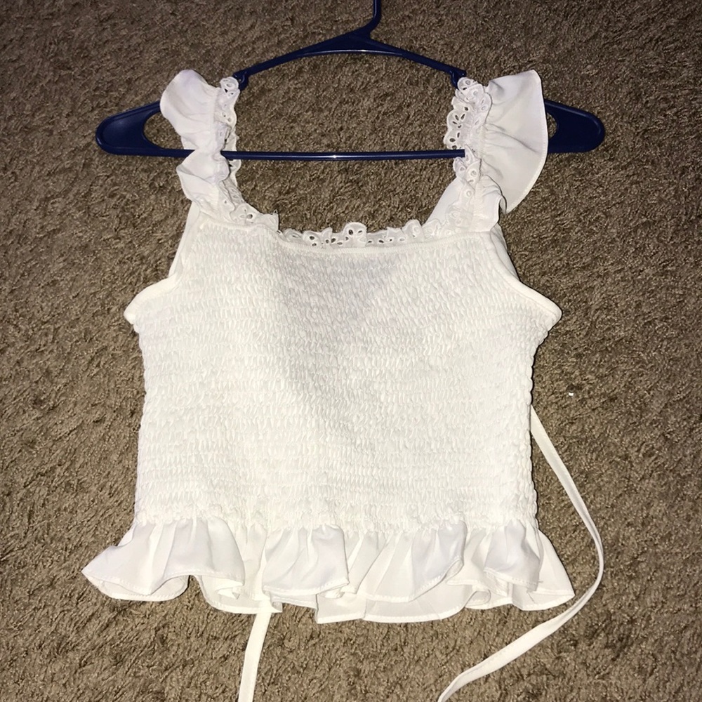Cute white tank and ties in the back